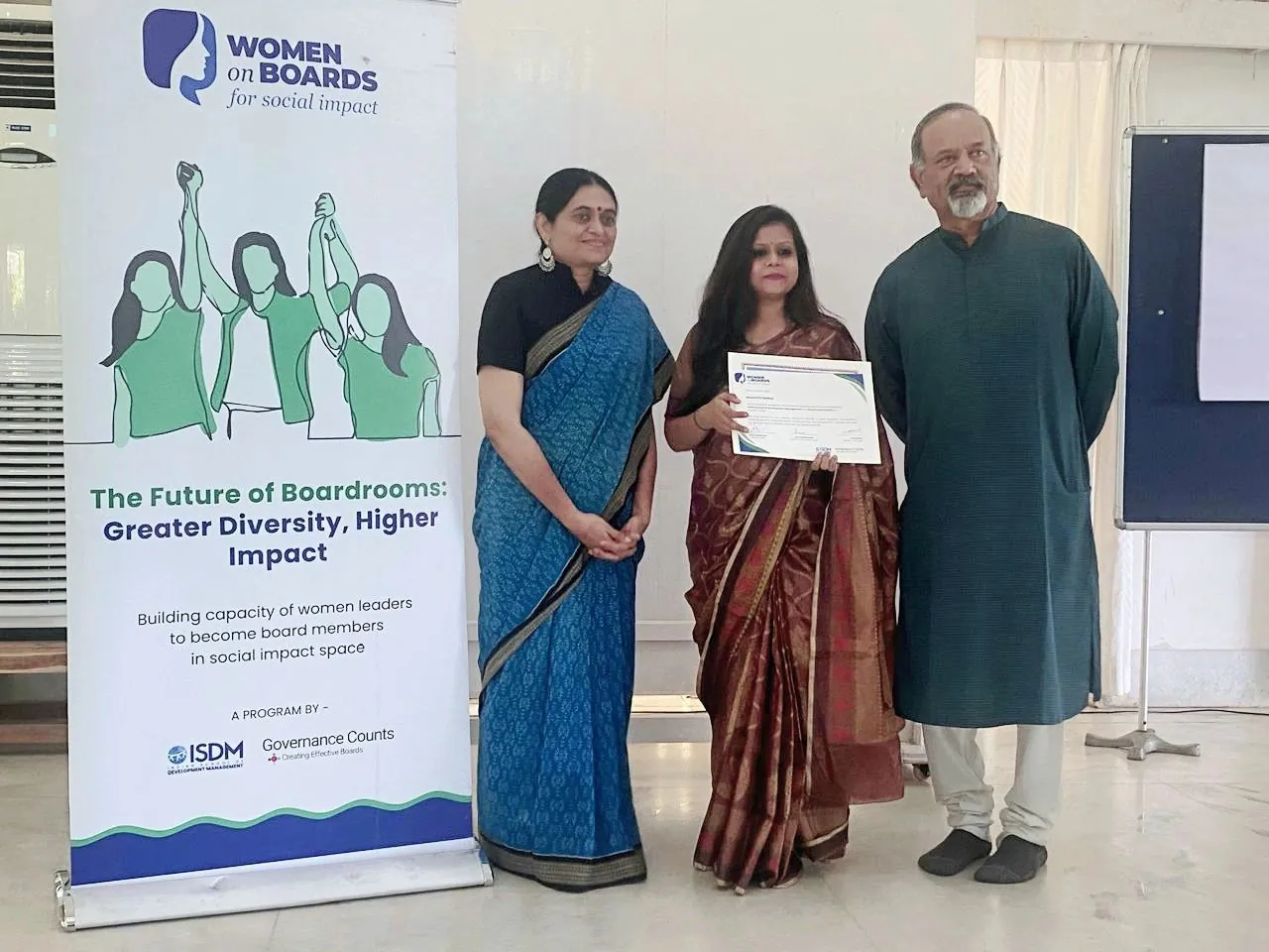 Receiving a Women on Boards Programme certificate at the Indian School of Development Management